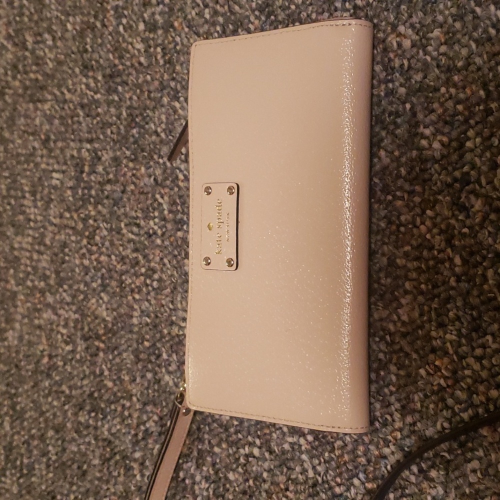 Kate Spade cream leather wristlet